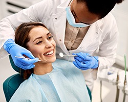 Woman smiling during dental exam